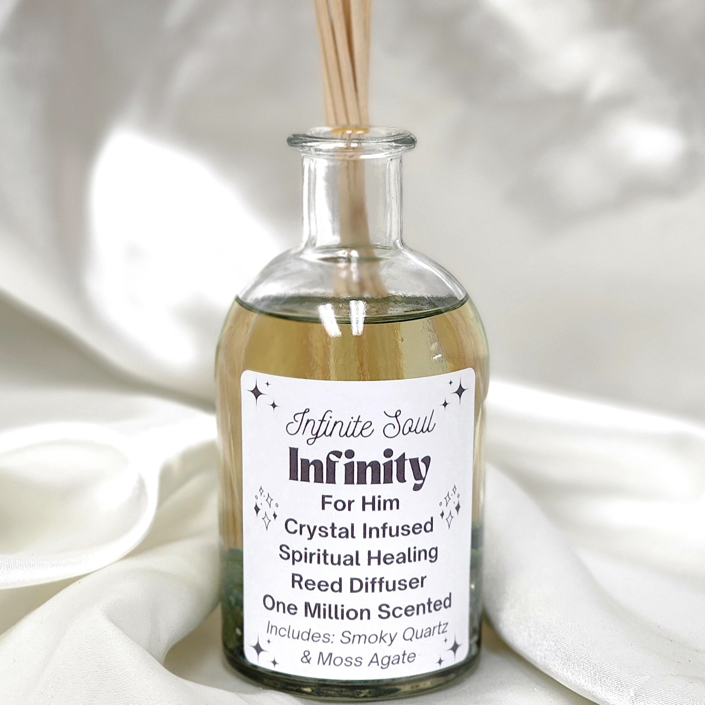 Infinity: For Him Crystal Infused Reed Diffuser with Smoky Quartz and Moss Agate crystals, showcasing elegant design and eco-friendly packaging.