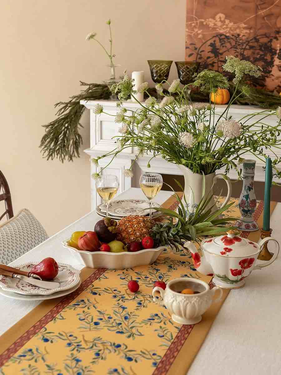 Elegant Italian floral decorative table runner with vibrant prints and handmade tassels, perfect for enhancing dining decor.