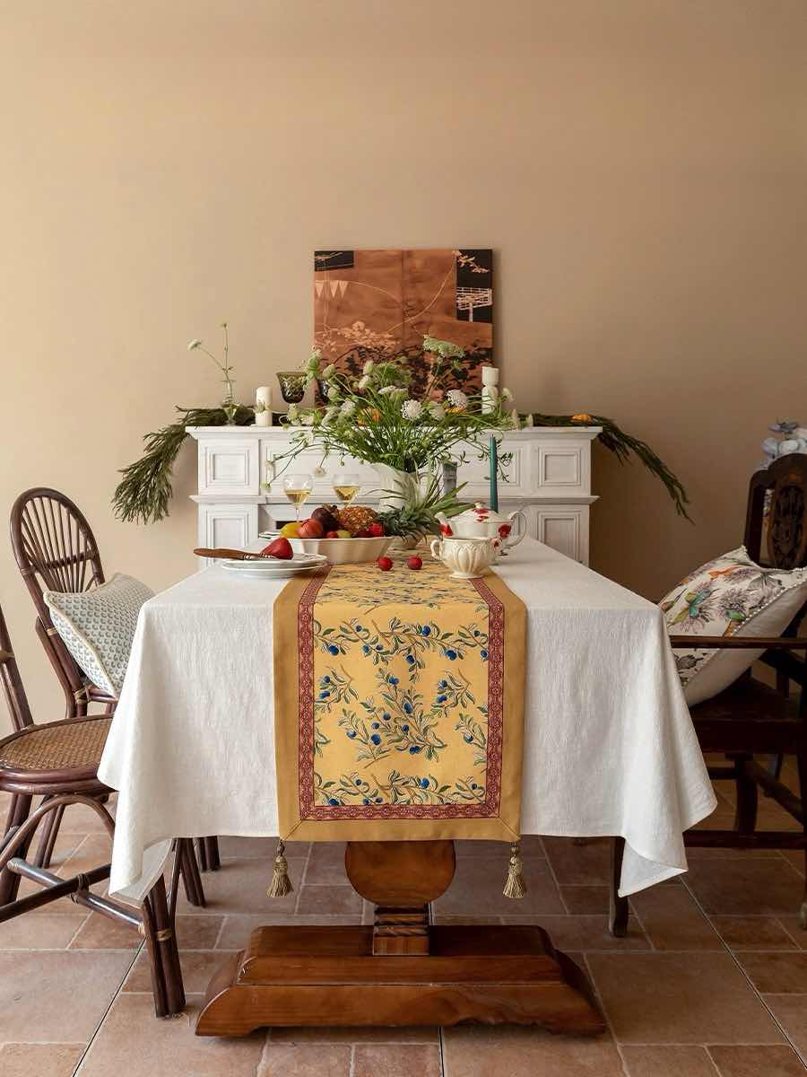 Elegant Italian floral decorative table runner with vibrant prints and handmade tassels, perfect for enhancing dining decor.