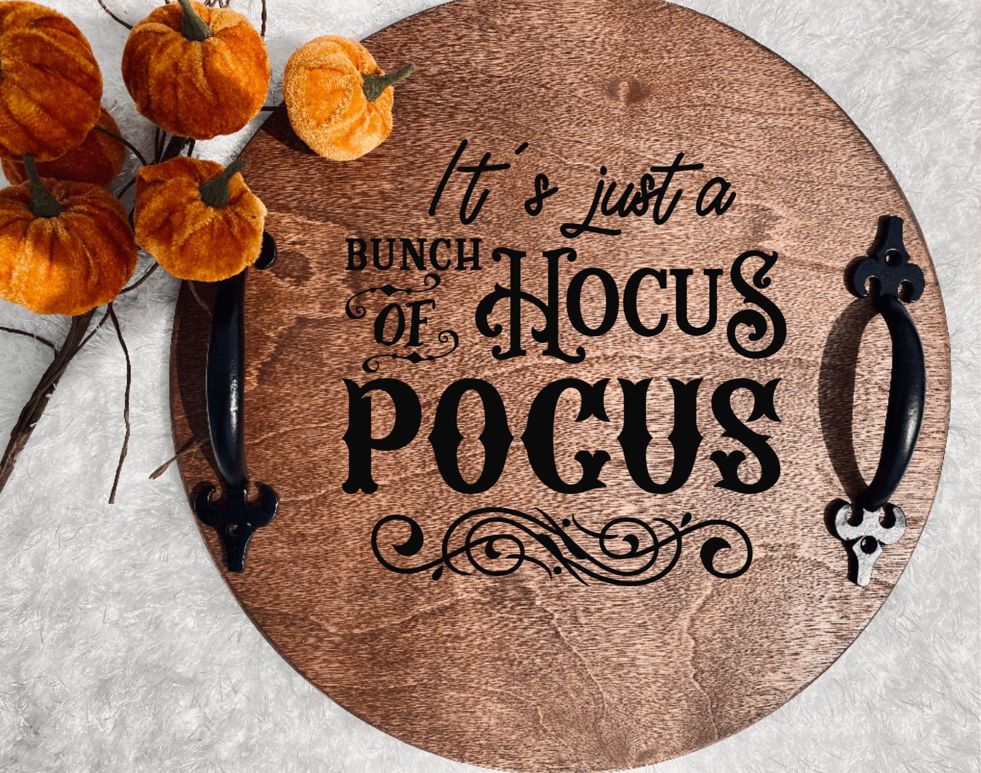 Handmade wooden serving tray with a Hocus Pocus design, featuring a rich chestnut stain and black metal handles.