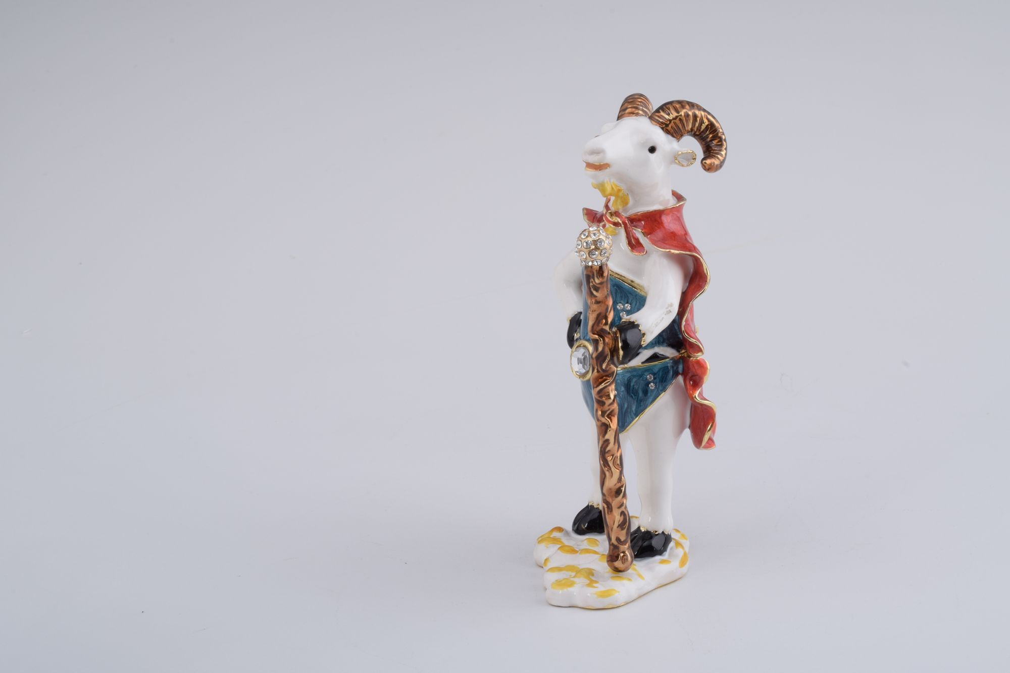 Handmade King of Goats trinket box with enamel paint and Austrian crystals, featuring a silver plating and a magnetic closure.