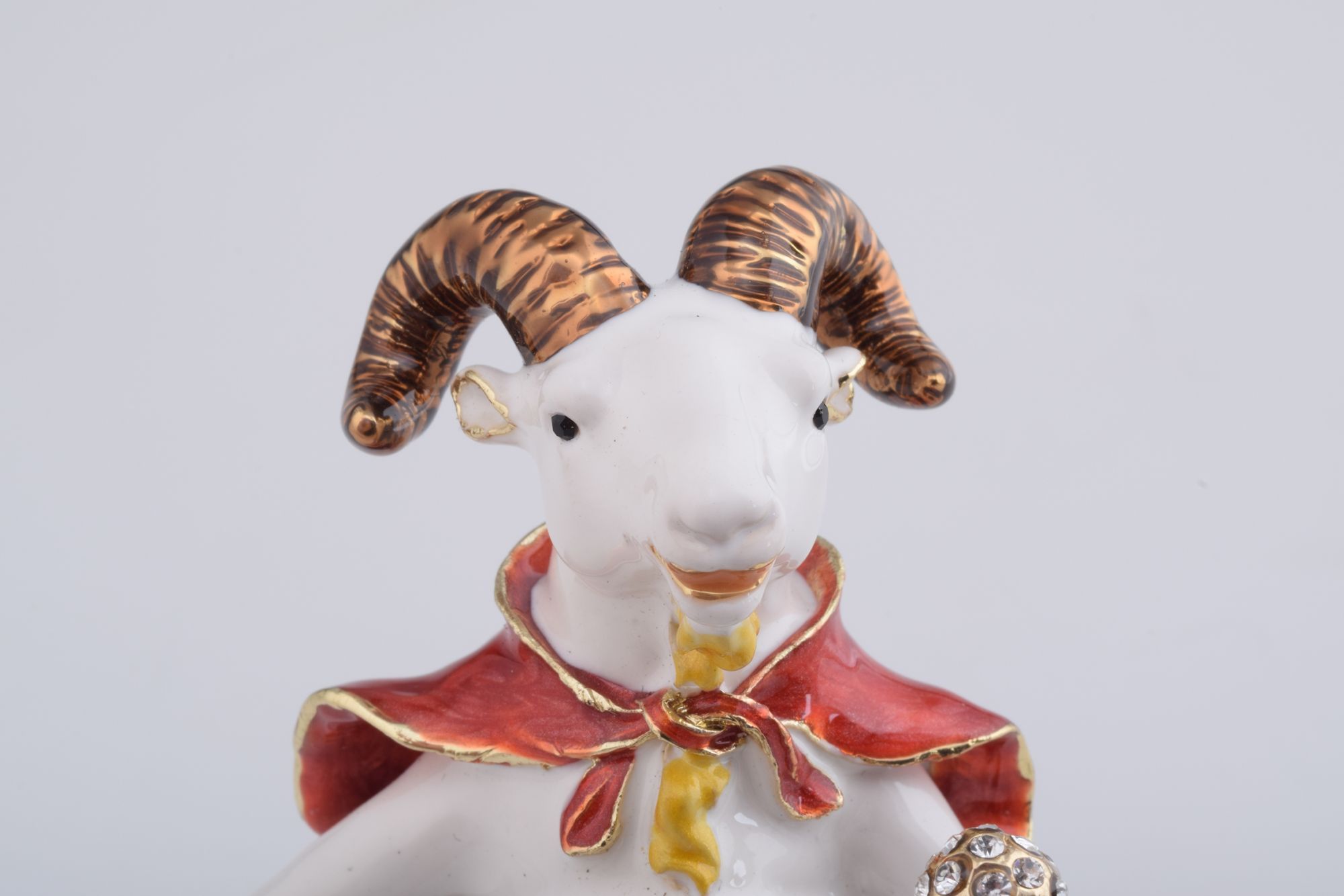 Handmade King of Goats trinket box with enamel paint and Austrian crystals, featuring a silver plating and a magnetic closure.