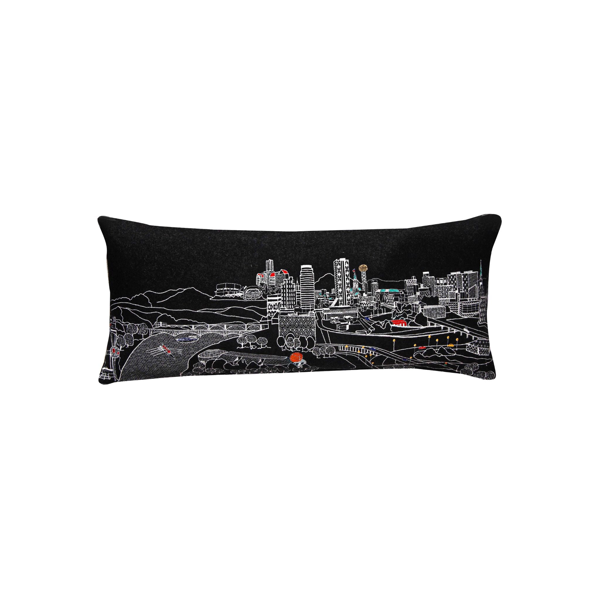 Knoxville Pillow featuring a vibrant design inspired by Knoxville, Tennessee, with a red zipper at the bottom.