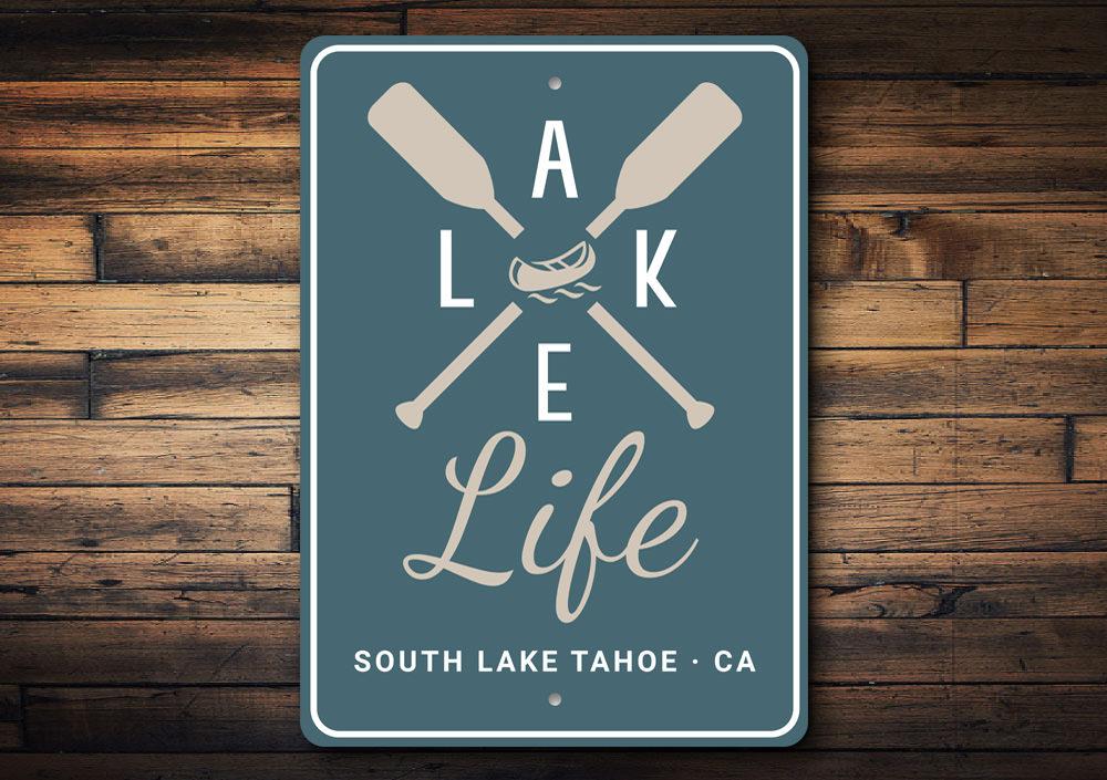 A beautifully crafted Lake Life Sign made of aluminum, showcasing a serene lakeside theme, perfect for home decor.