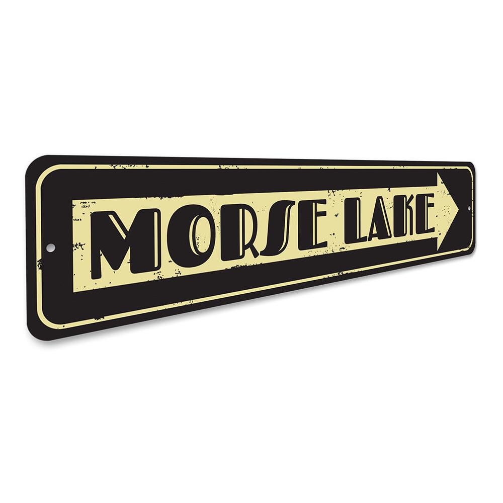 A personalized Lake Name Arrow Sign made of high-quality aluminum, featuring customizable text and a rustic design, perfect for lakehouse decor.