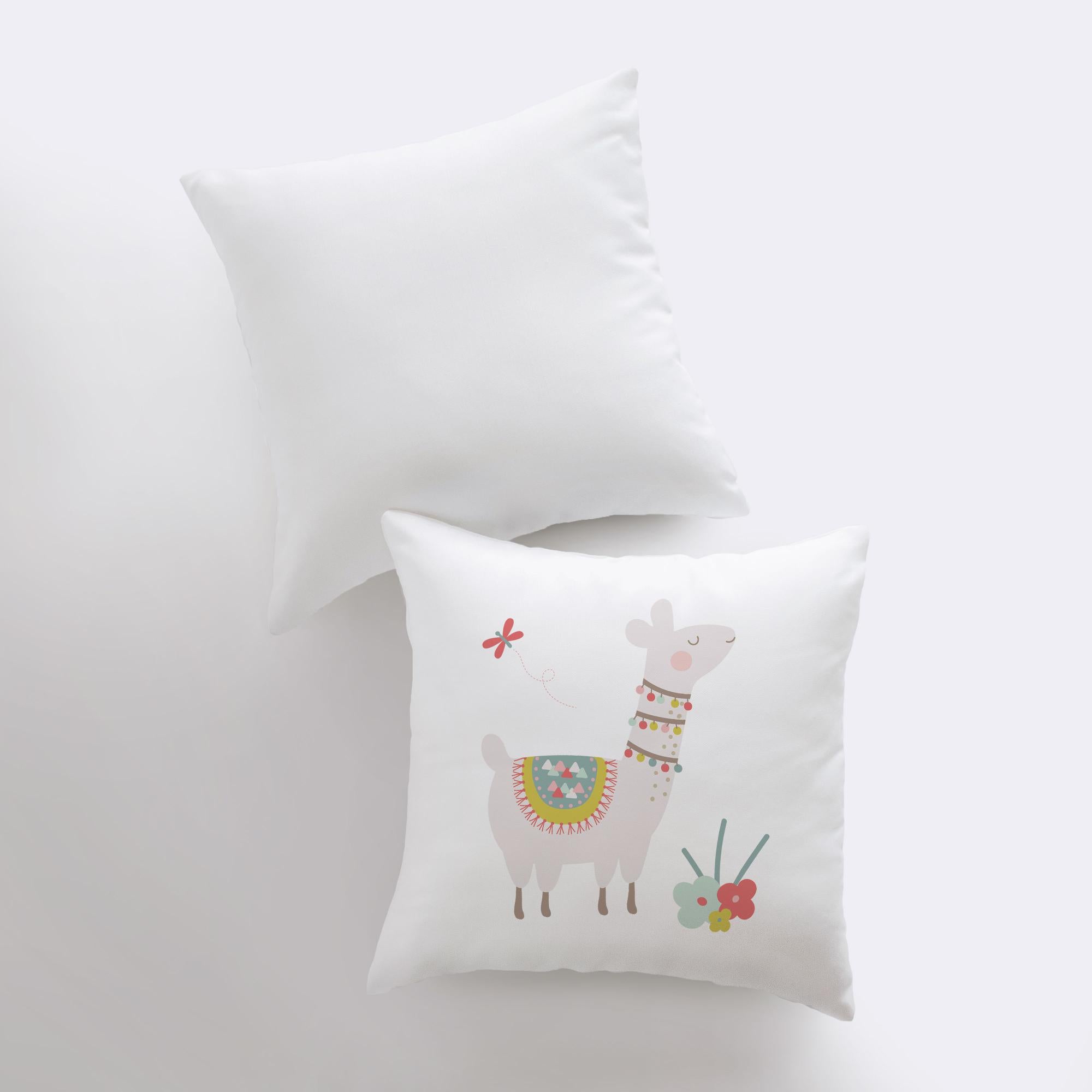 A charming Llama pillow cover featuring vibrant flowers on the front and a white back, showcasing a concealed zipper for easy use.