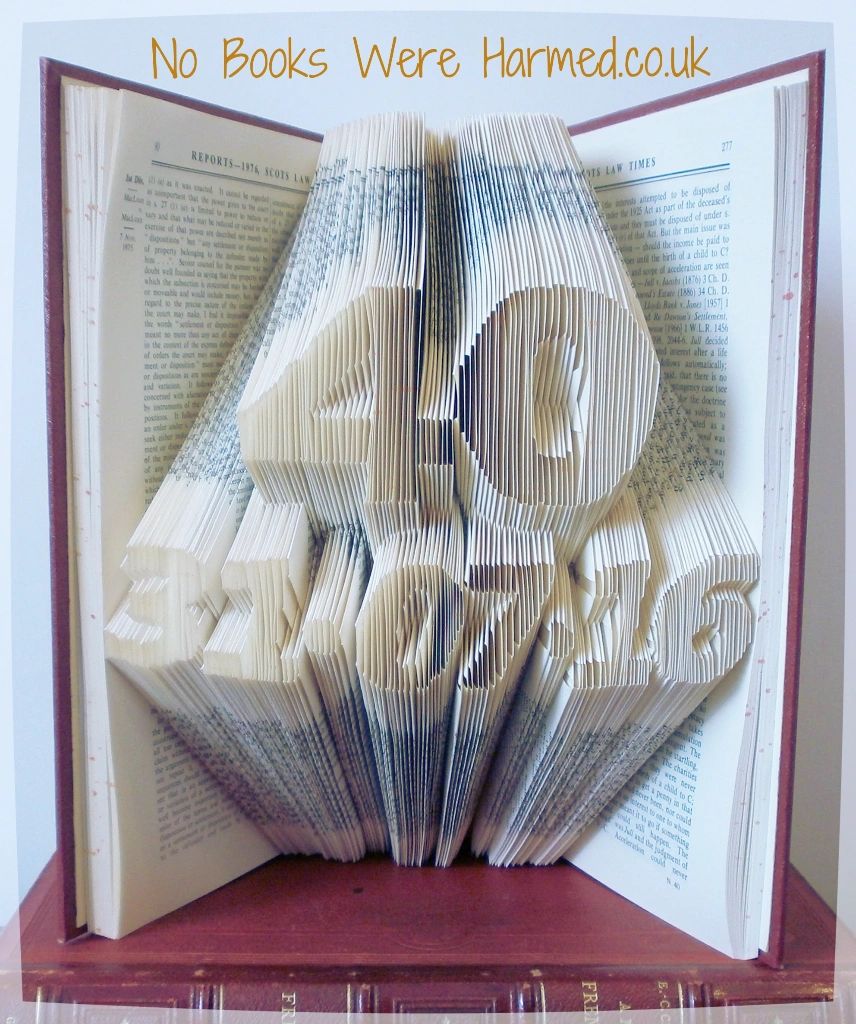 Large personalised keepsake featuring a unique date and number, handcrafted from vintage book pages with intricate folds.