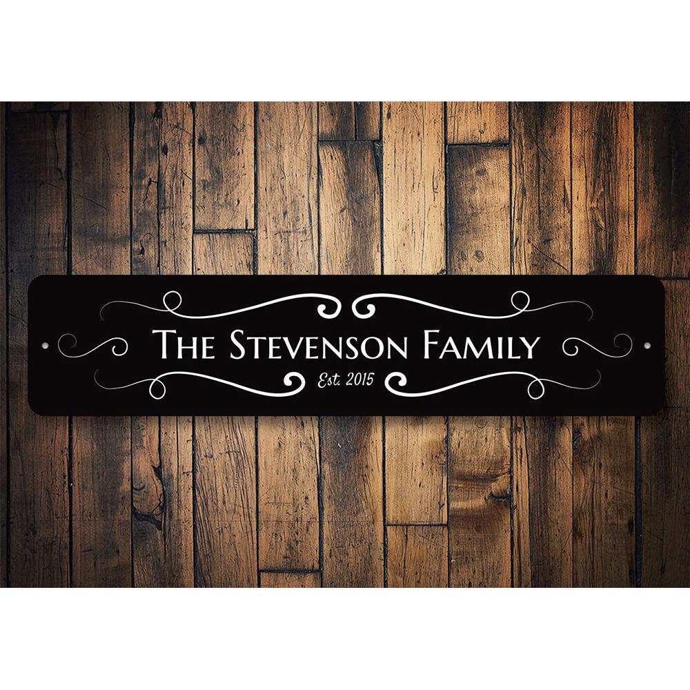 A beautifully crafted Last Name Sign made of high-quality aluminum, featuring customizable text for personalized home decor.