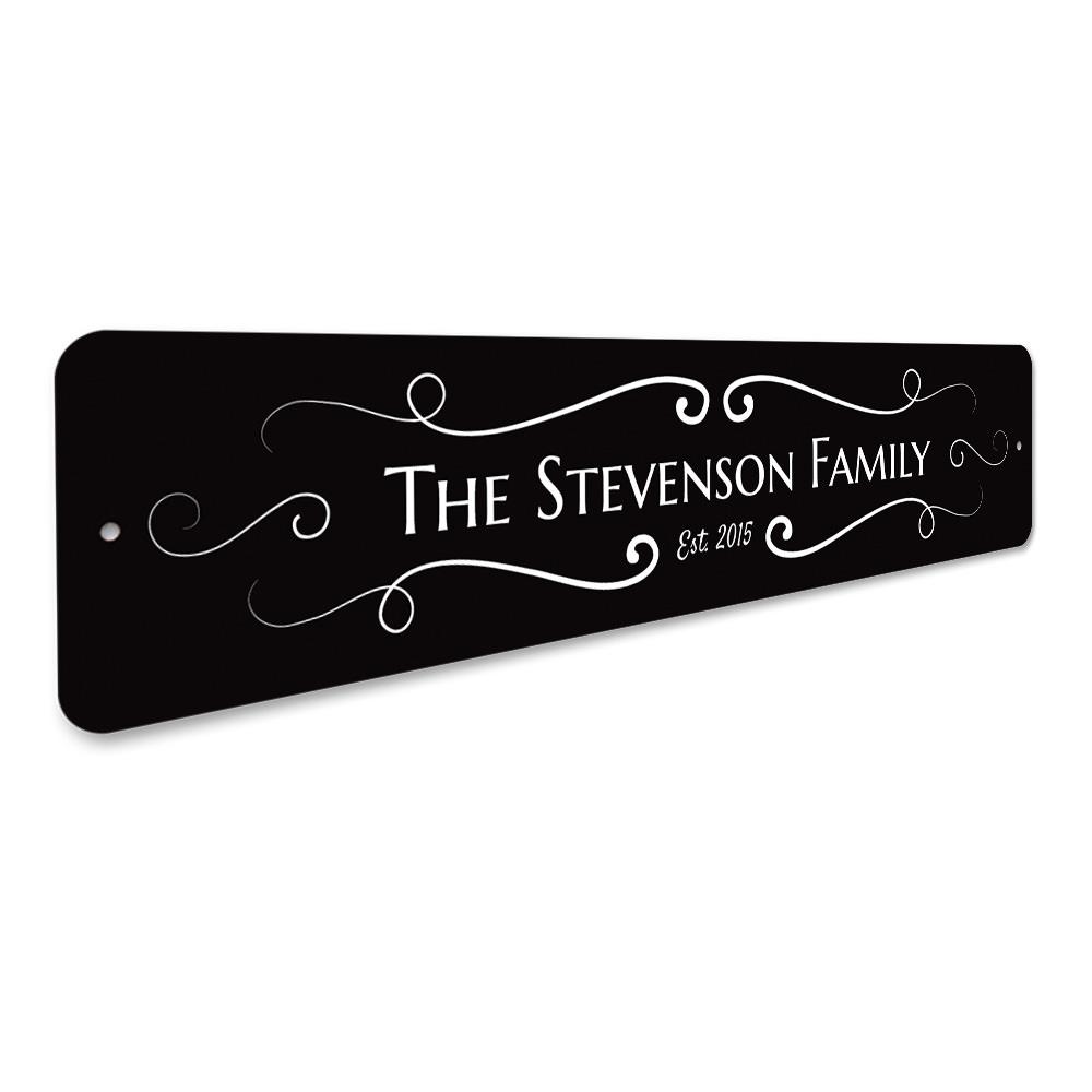 A beautifully crafted Last Name Sign made of high-quality aluminum, featuring customizable text for personalized home decor.