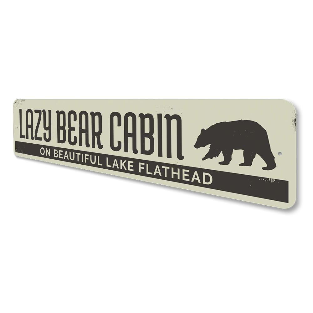 Lazy Bear Cabin Sign made of durable aluminum, featuring a rustic design perfect for lakehouses and cabins.