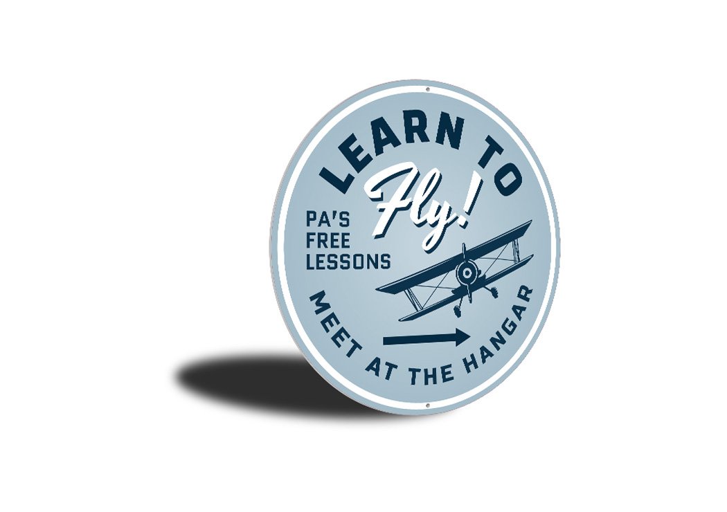 Customizable Learn to Fly Hangar Sign made from high-quality aluminum, featuring aviation-themed design, perfect for home decor.