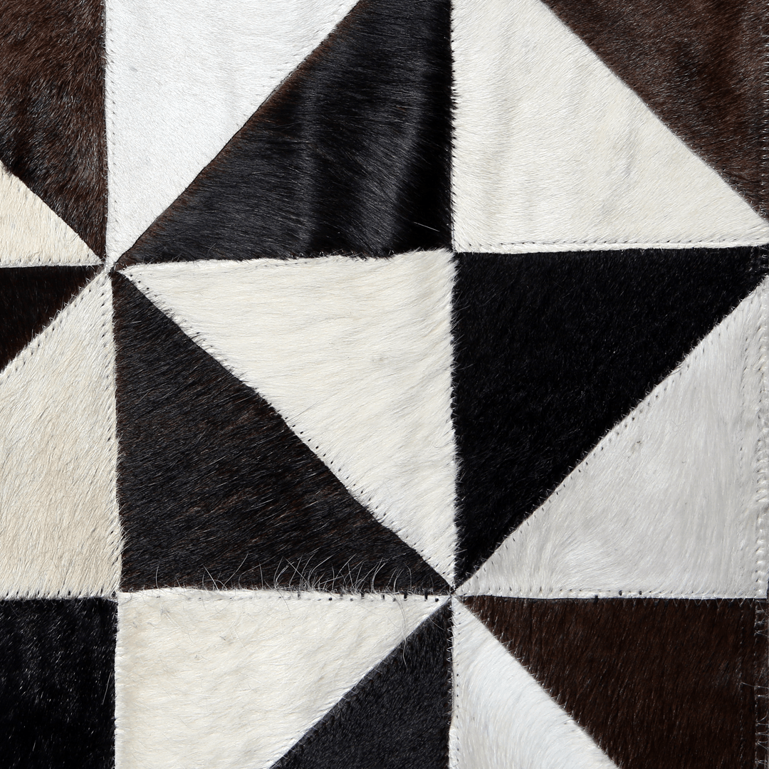 Handmade leather rug made from genuine cowhide, featuring a small pattern patchwork design, ideal for home decor.