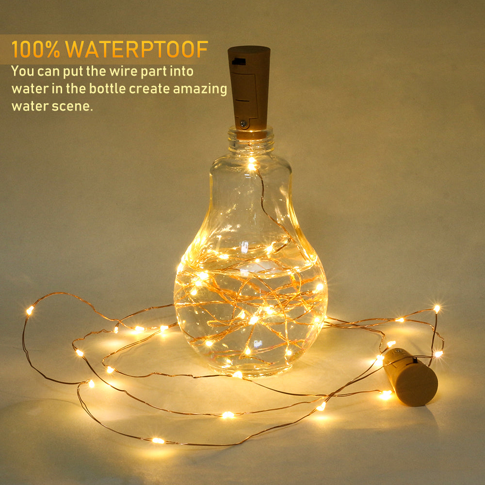 LED Copper Wire Lights in warm white, elegantly illuminating a glass bottle, showcasing a festive and cozy ambiance.