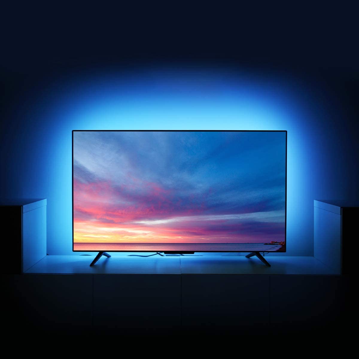 32.8 ft LED Strip Lights with 300 RGB LEDs, waterproof and flexible for home decoration.