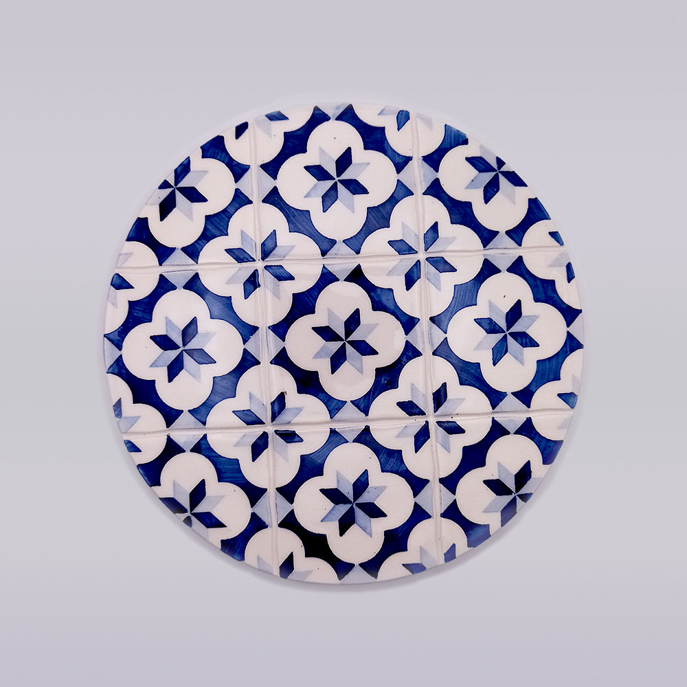 Leiria Ceramic Trivet Hot Pad featuring hand-painted intricate designs, perfect for protecting surfaces from heat.