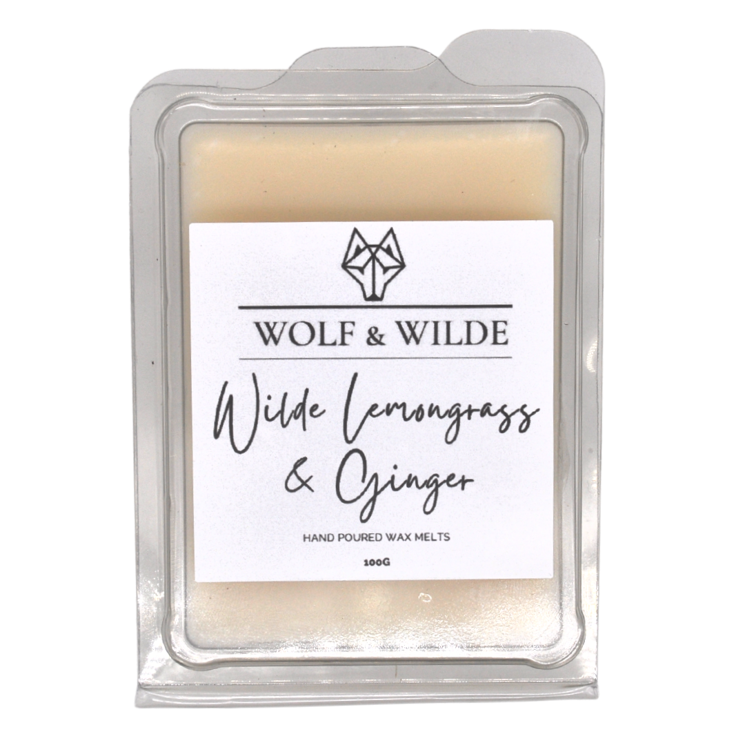 A close-up of Lemongrass & Ginger Soy Wax Melts in a decorative dish, showcasing their vibrant colors and texture.