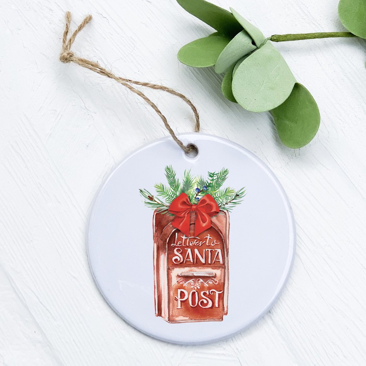 A beautifully crafted porcelain ornament shaped like a mailbox, featuring a festive design for letters to Santa, perfect for holiday decor.