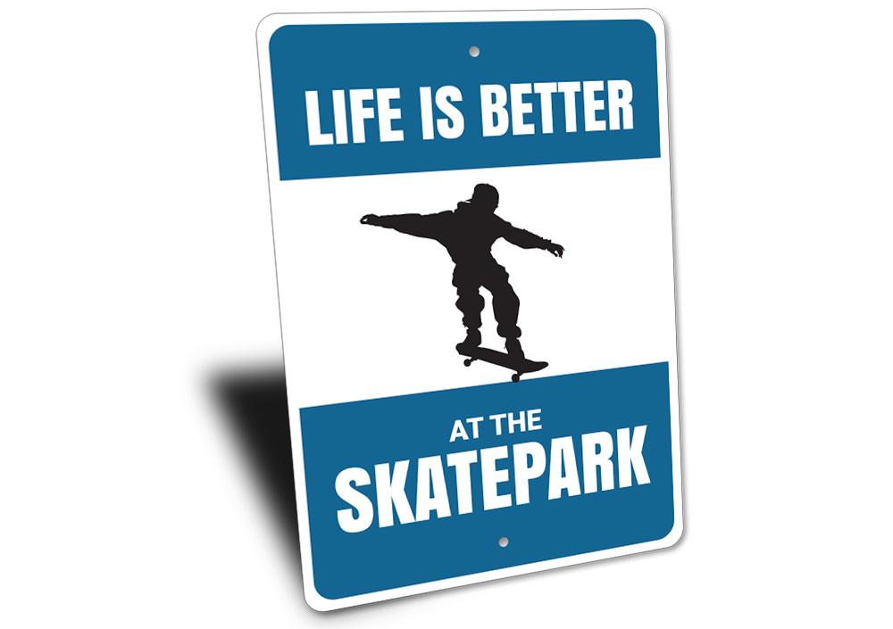 A decorative metal sign reading 'Life is Better at the Skatepark', showcasing vibrant colors and a stylish design, perfect for skateboarding enthusiasts.