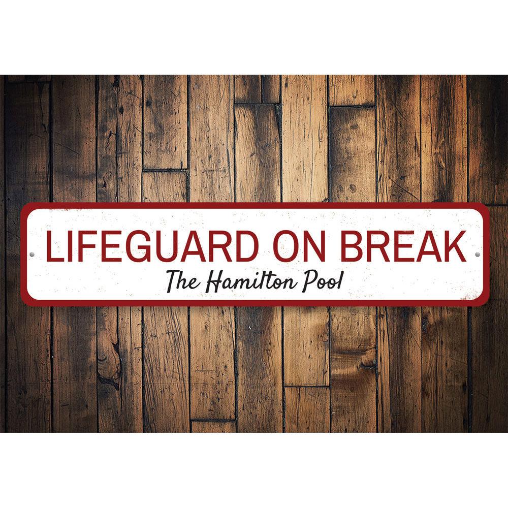 Lifeguard on Break Sign made from durable aluminum, featuring customizable text, perfect for lakehouses and cabins.