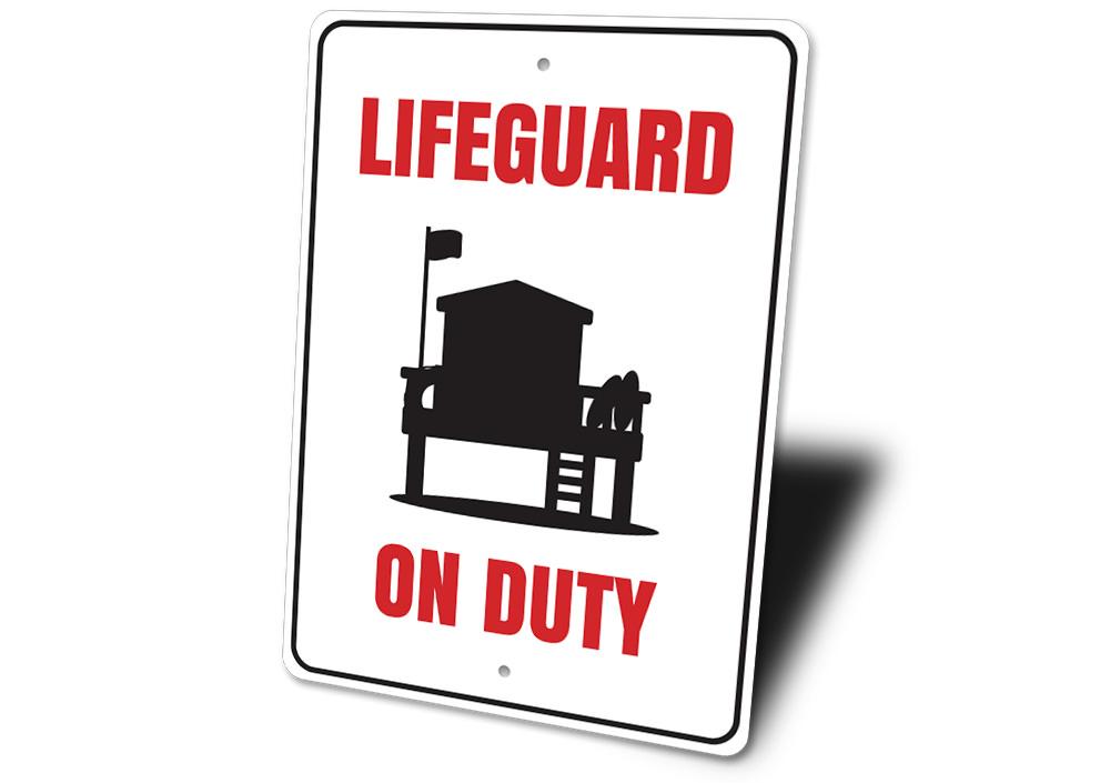 Lifeguard on Duty sign made of high-quality aluminum, featuring vibrant colors and a beach-themed design, perfect for coastal decor.