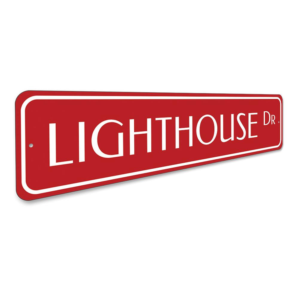 Lighthouse Drive Sign made of high-quality aluminum, featuring a coastal design perfect for beach houses and outdoor decor.
