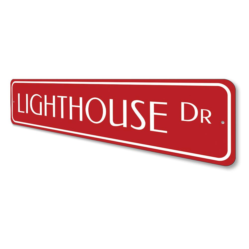 Lighthouse Drive Sign made of high-quality aluminum, featuring a coastal design perfect for beach houses and outdoor decor.