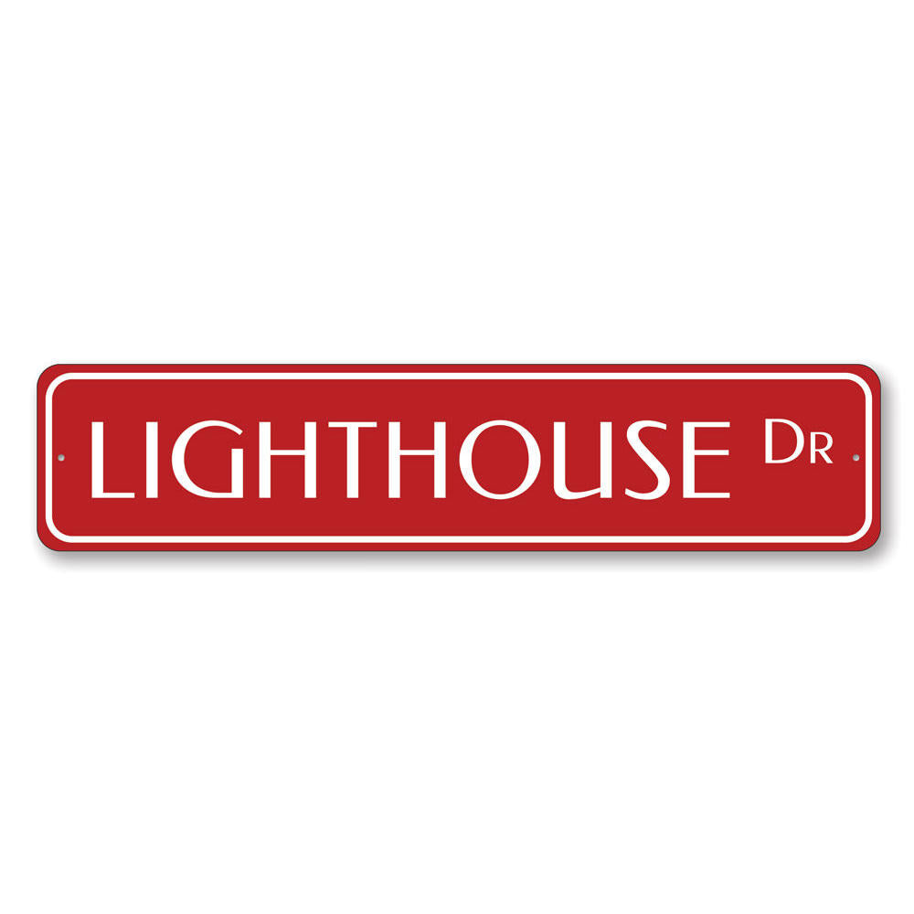 Lighthouse Drive Sign made of high-quality aluminum, featuring a coastal design perfect for beach houses and outdoor decor.