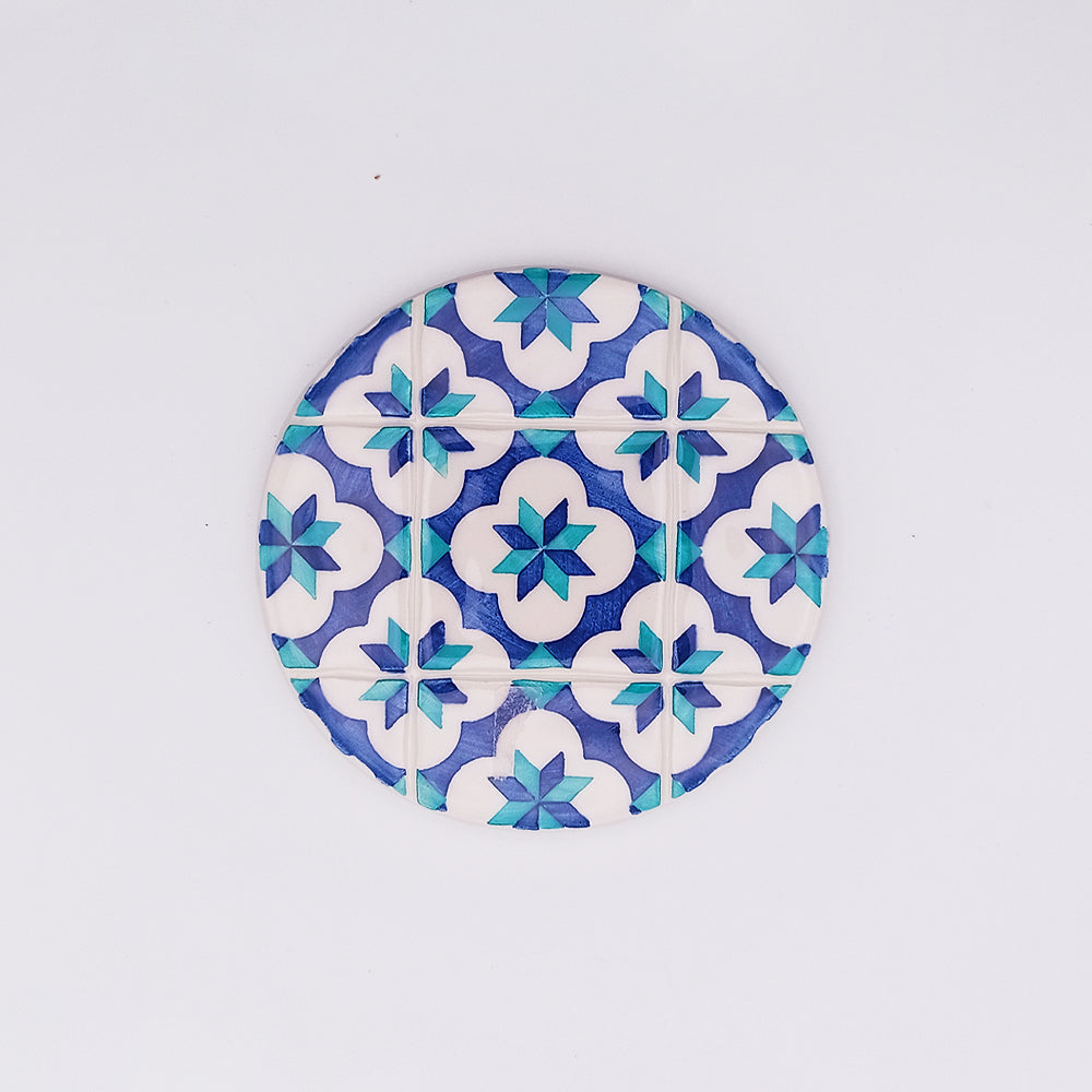 Hand-painted Lisbon Ceramic Tile Cup Pad showcasing vibrant designs and premium ceramic quality.