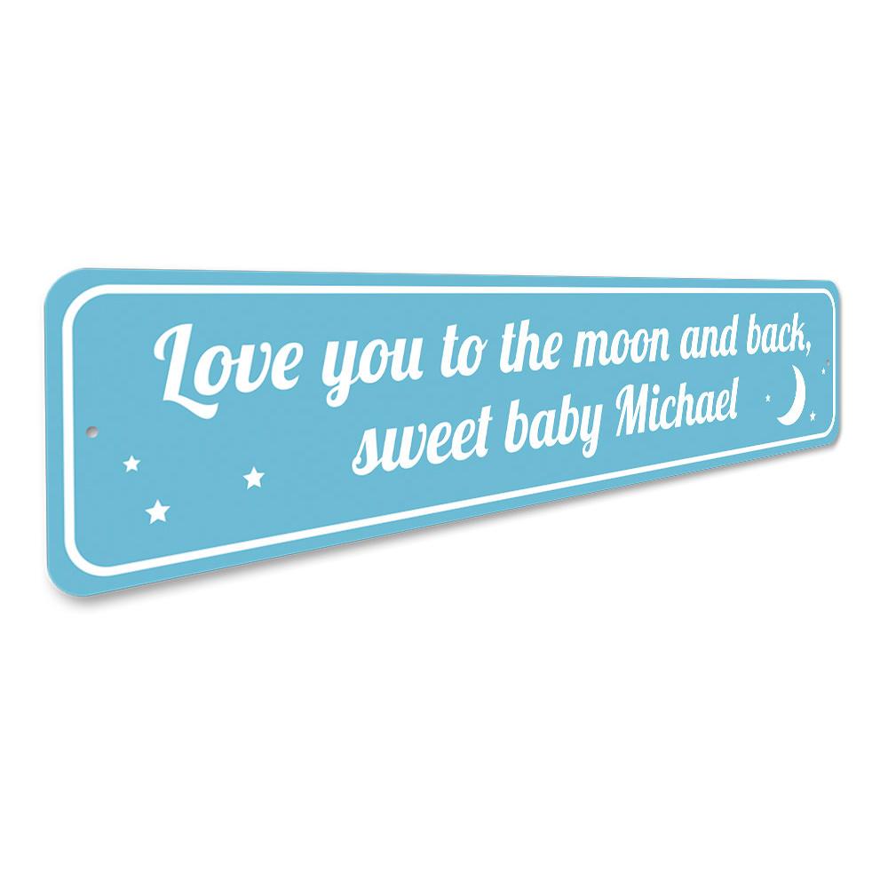 Decorative 'Love You To The Moon and Back' sign made of aluminum, featuring a whimsical design perfect for children's rooms.