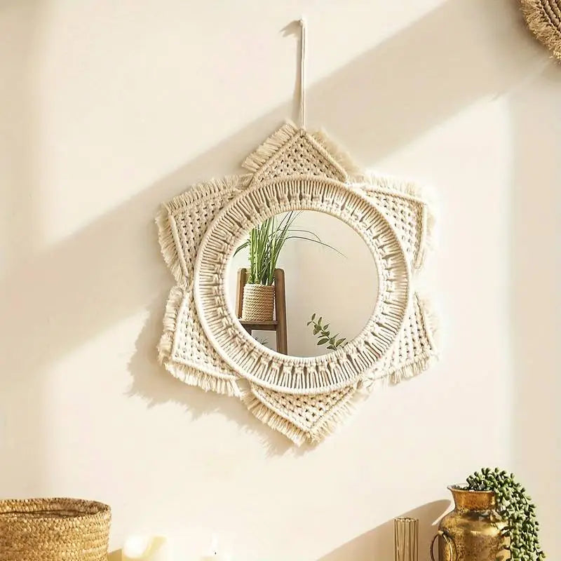 A beautifully crafted macrame hanging decorative wall mirror with intricate cotton rope design, perfect for boho chic decor.