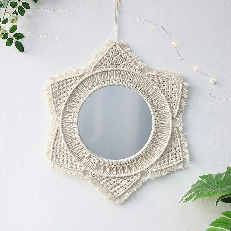 A beautifully crafted macrame hanging decorative wall mirror with intricate cotton rope design, perfect for boho chic decor.
