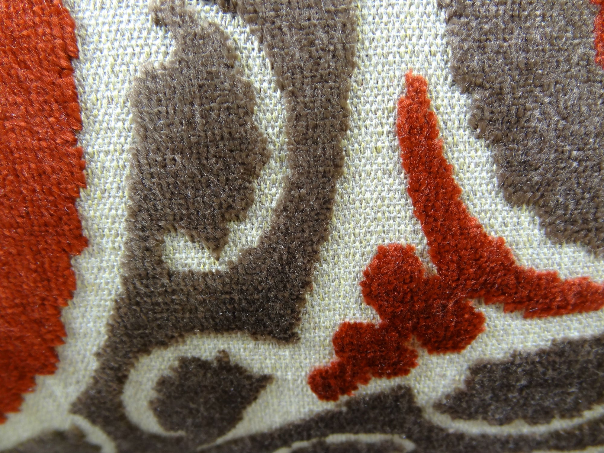 Madeline Red and Brown Handmade Luxury Pillow showcasing a geometric pattern with a rich color blend, featuring an invisible zipper and plush insert.