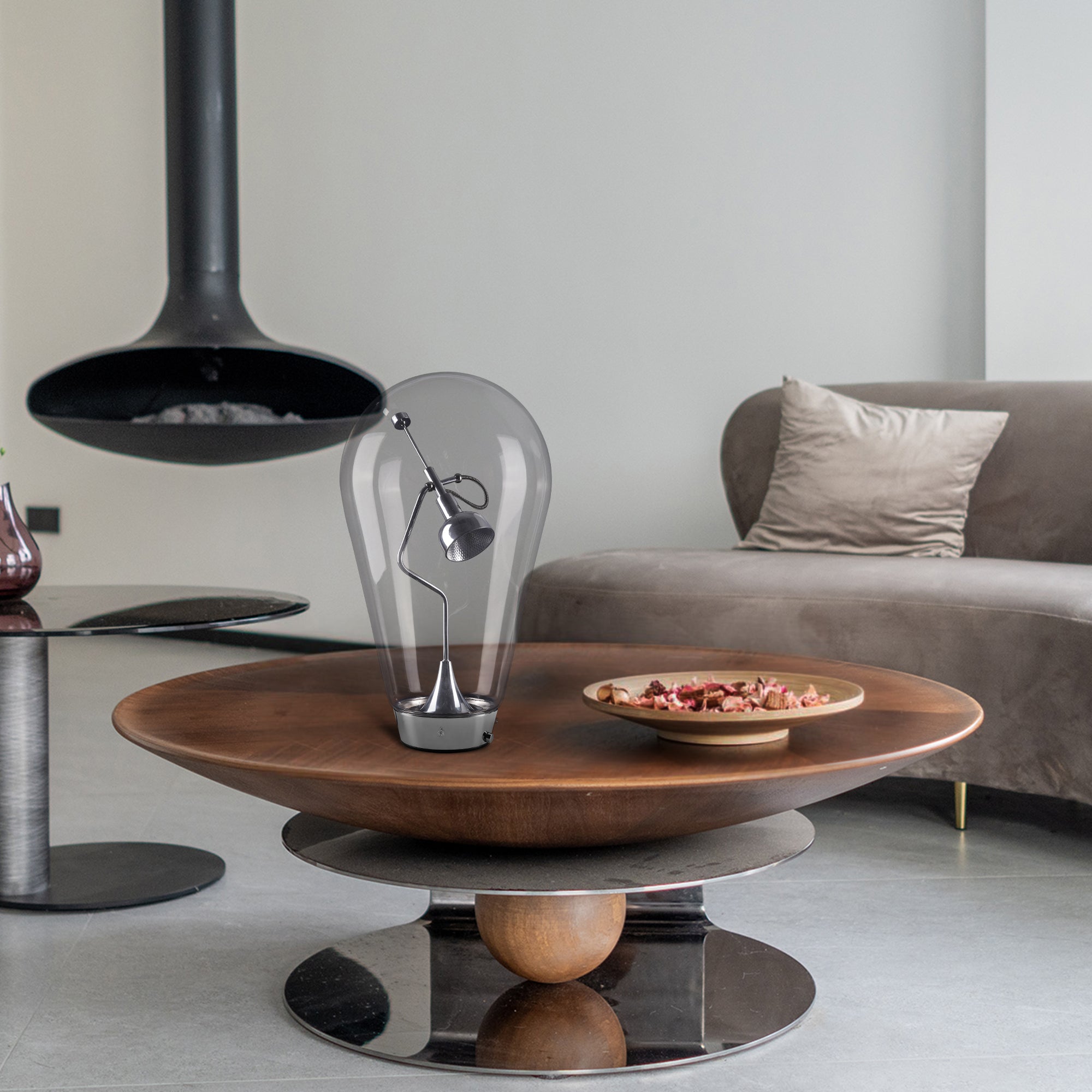 Magnetic Dimmable Table Lamp featuring a clear glass shade and nickel-plated base, showcasing its modern geometric design.