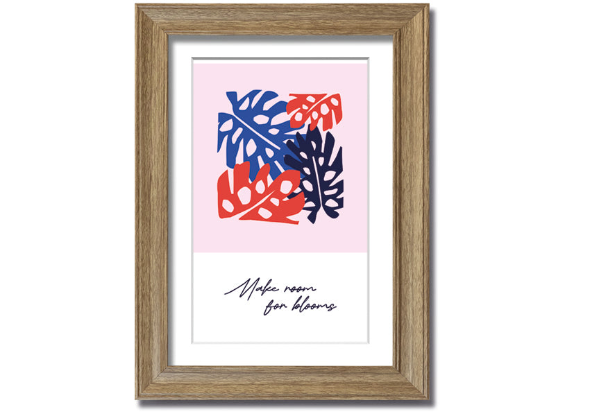 A vibrant floral framed print titled 'Make Room For Blooms', showcasing colorful flowers in a stylish frame.