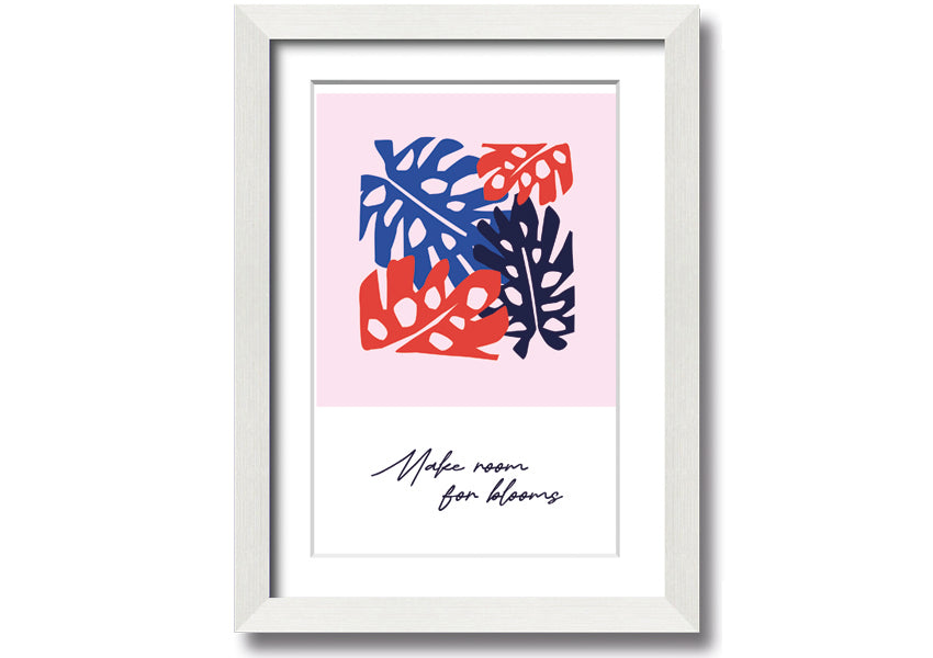 A vibrant floral framed print titled 'Make Room For Blooms', showcasing colorful flowers in a stylish frame.