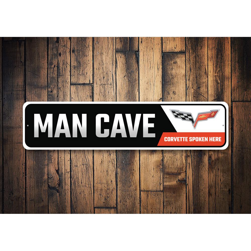 "Man Cave" sign on wood.