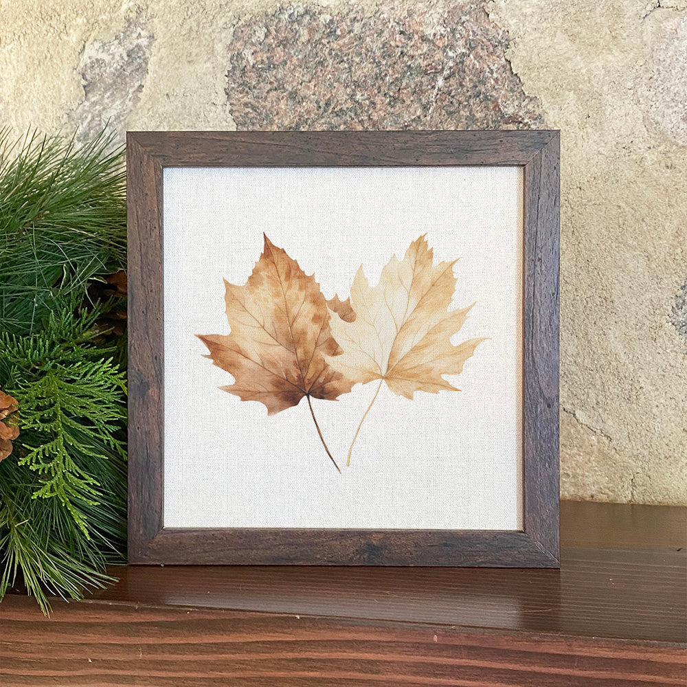 Maple Leaves Framed Sign with walnut veneer frame and linen-look background, showcasing autumn leaves design.