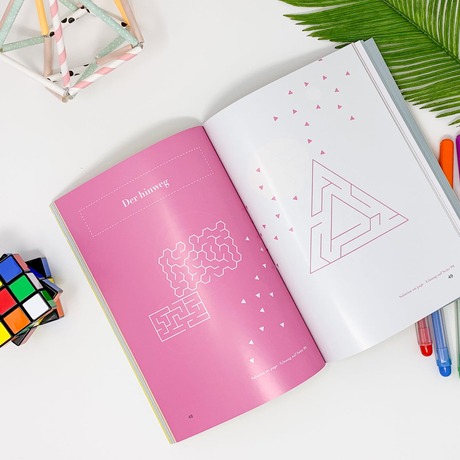 A colorful maze book titled 'Maze Mania' featuring various maze designs suitable for children aged 4-6.