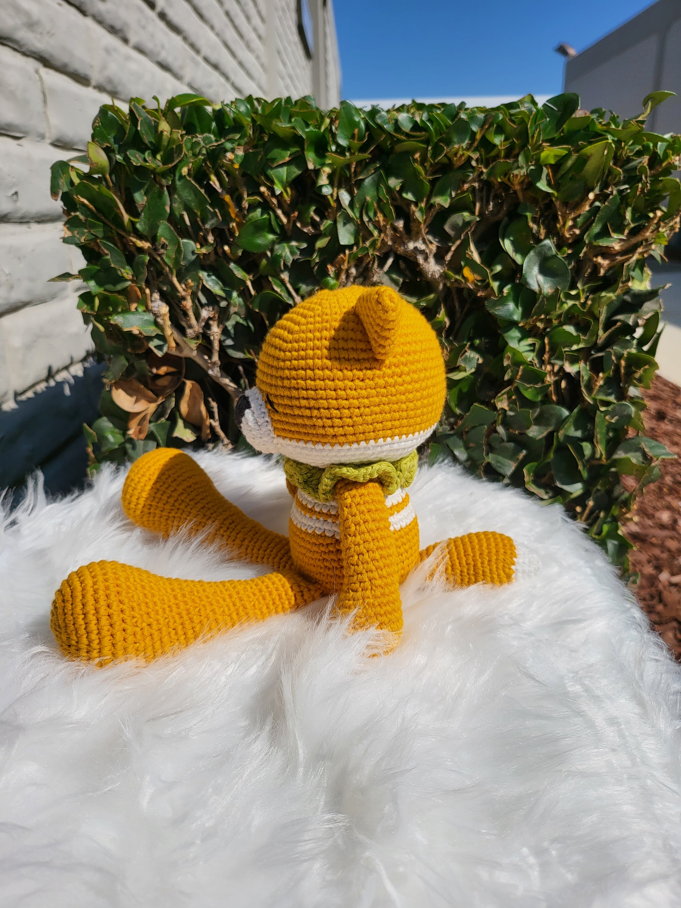 Medium Sitting Fox V2 crochet toy made from 100% cotton yarn, featuring a charming design and soft texture, perfect for children.
