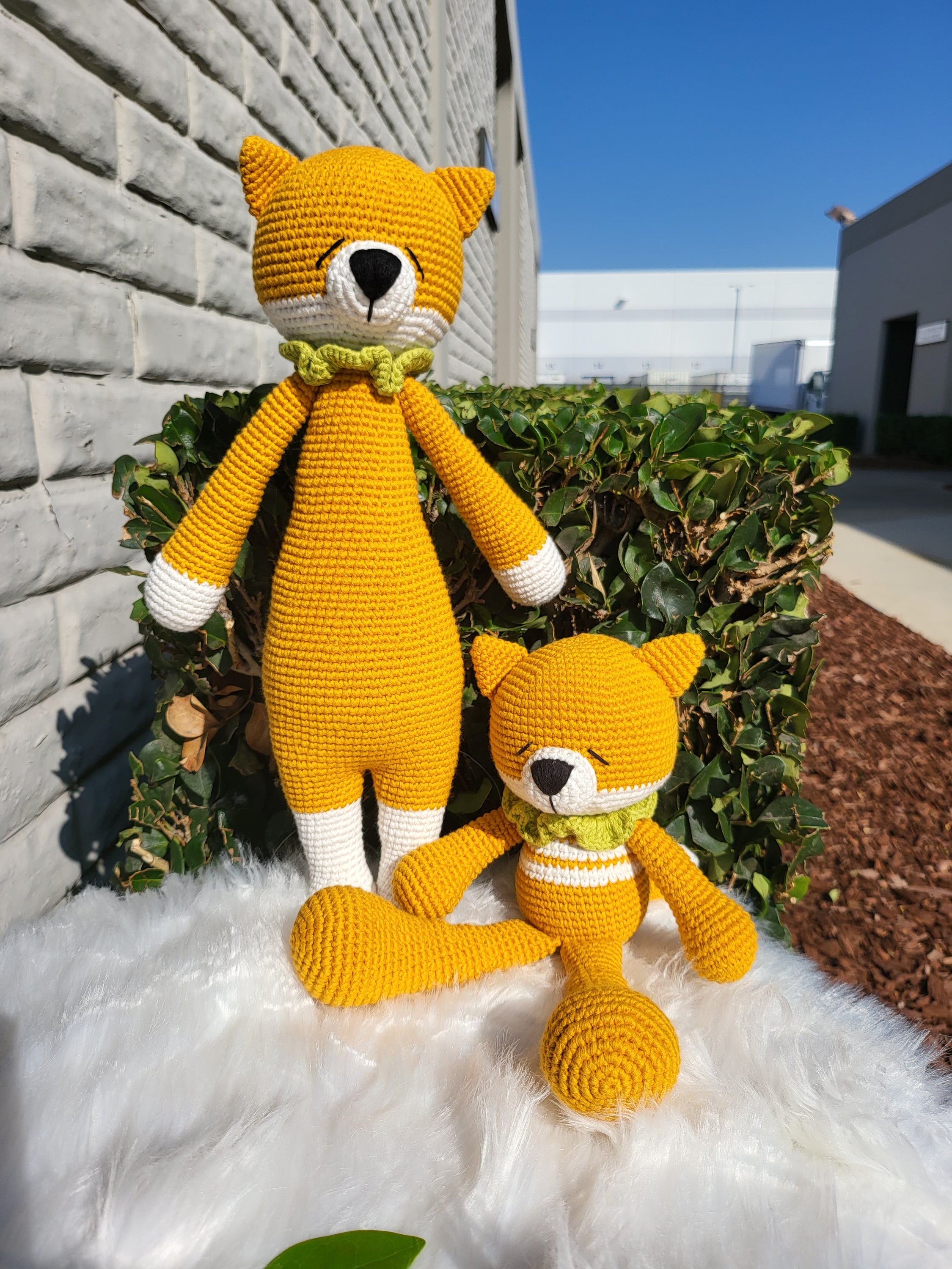 Medium Sitting Fox V2 crochet toy made from 100% cotton yarn, featuring a charming design and soft texture, perfect for children.