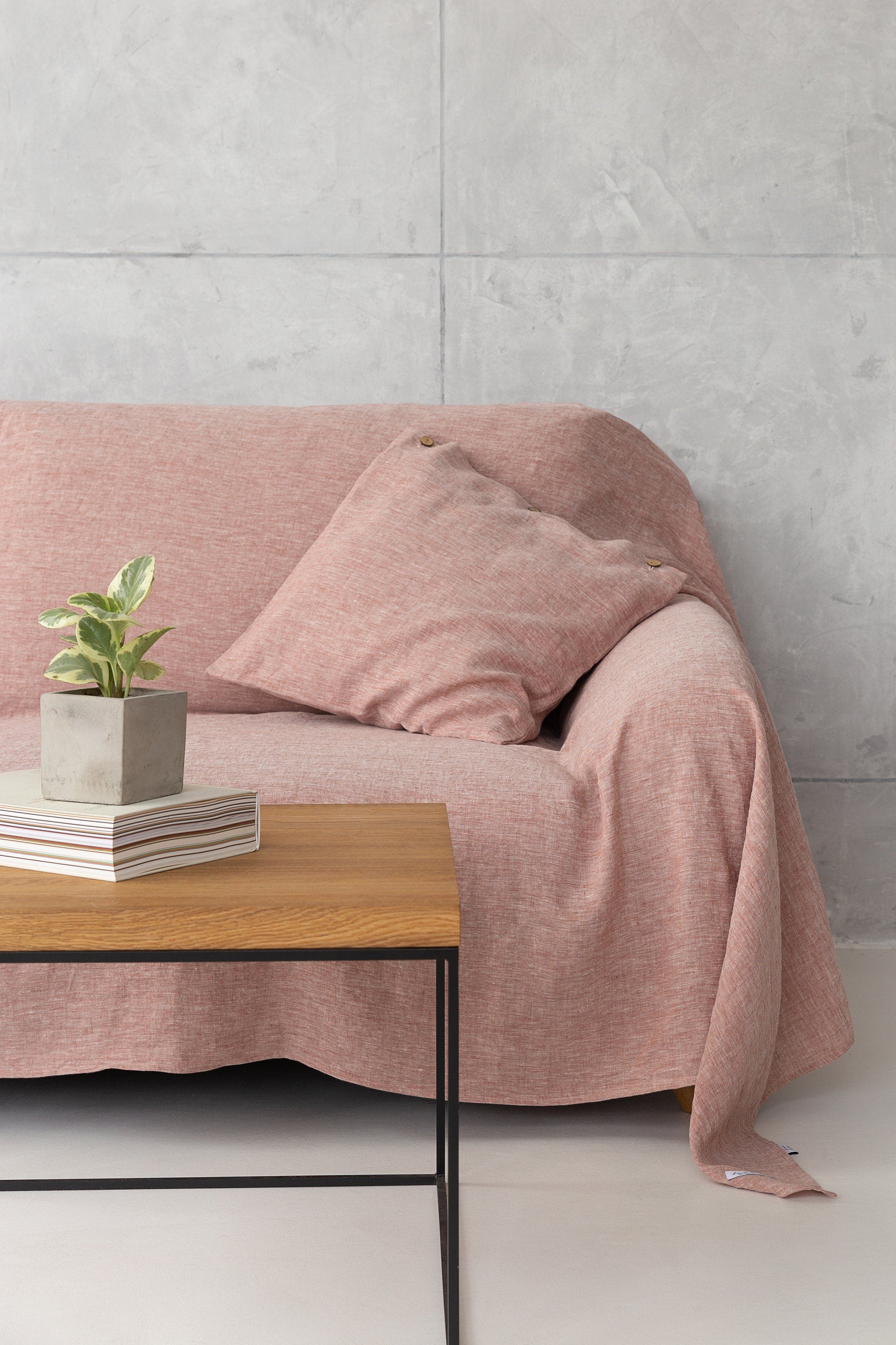 Melange Burgundy linen couch cover draped elegantly over a sofa, showcasing its soft texture and rich color.