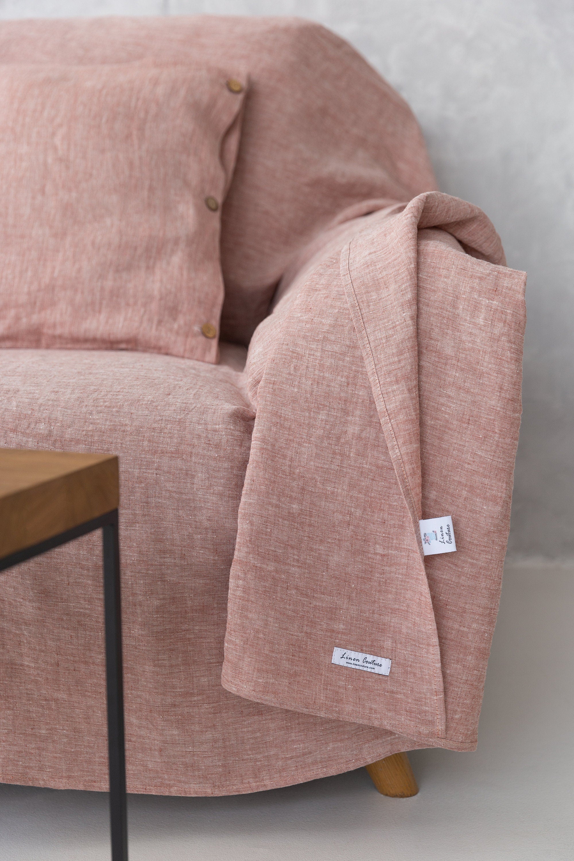 Melange Burgundy linen couch cover draped elegantly over a sofa, showcasing its soft texture and rich color.