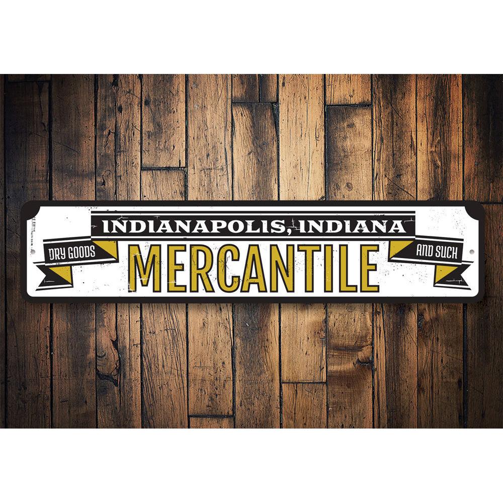 Mercantile Dry Goods Sign made of high-quality aluminum, featuring customizable text and pre-drilled holes for easy mounting.