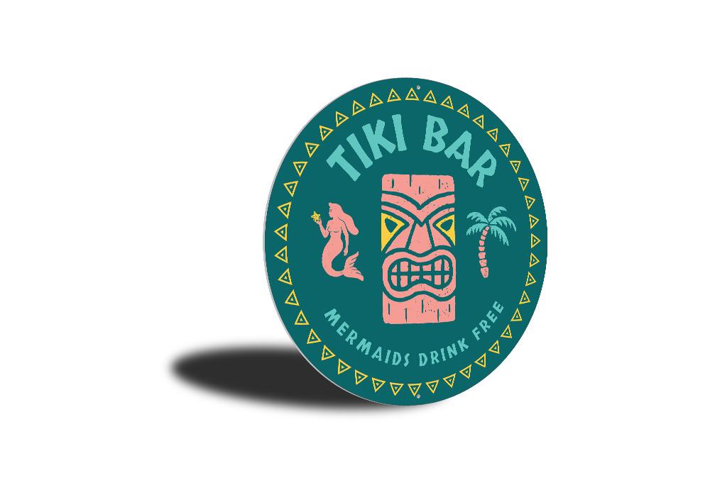 Mermaids Drink Free Tiki Bar Sign made of aluminum, featuring vibrant colors and whimsical design, perfect for home bars and outdoor spaces.