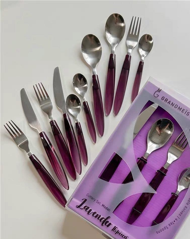 Meteor Flatware Set of 16 pieces featuring sleek modern cutlery with crystal-like handles, perfect for stylish dining.