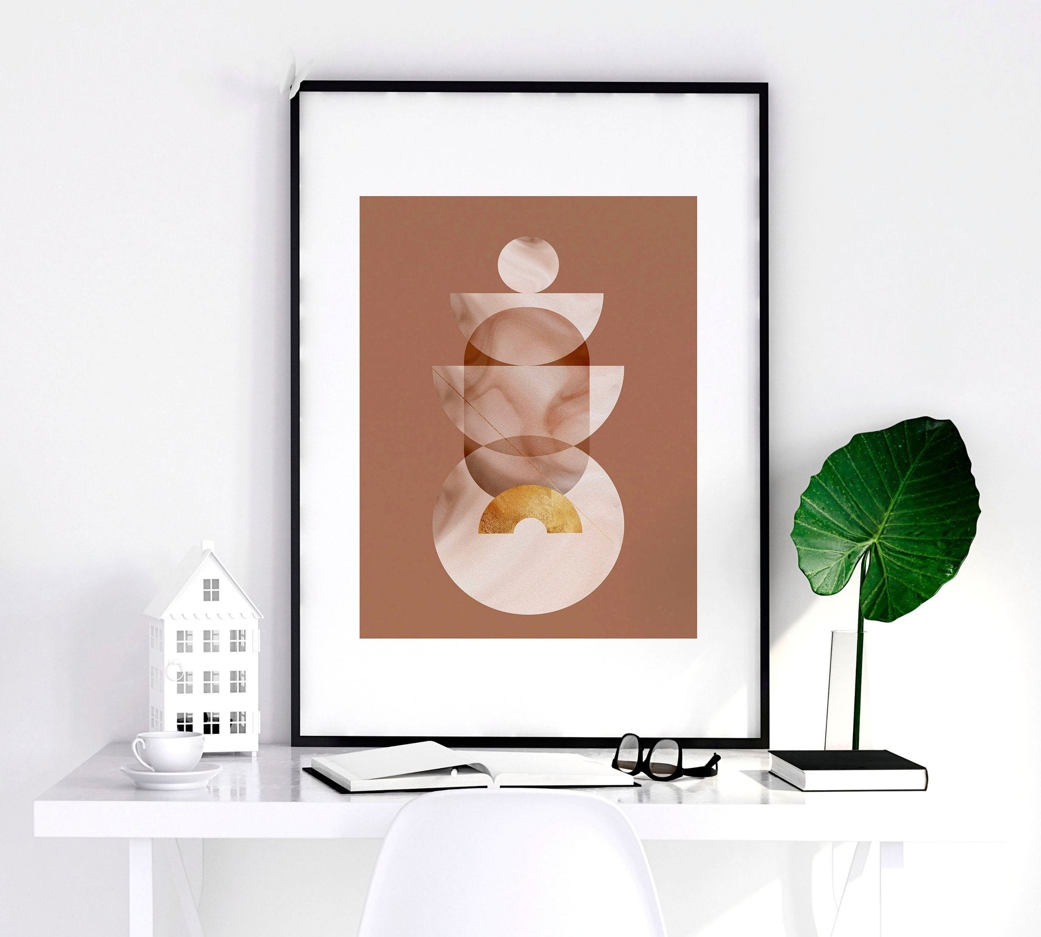 Set of 3 framed Mid Century Modern artwork prints featuring intricate designs in peach, terracotta, and gold colors, perfect for home decor.