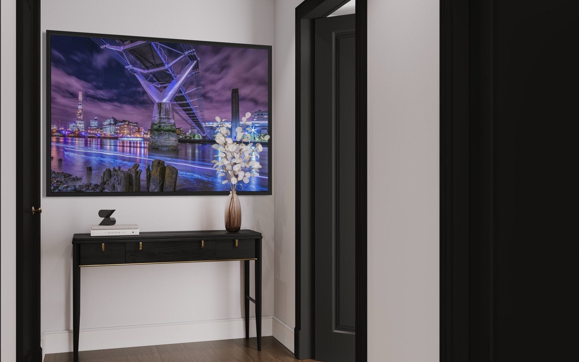 A stunning night view of the Millennium Bridge illuminated against the dark sky, showcasing its architectural beauty over the River Thames.