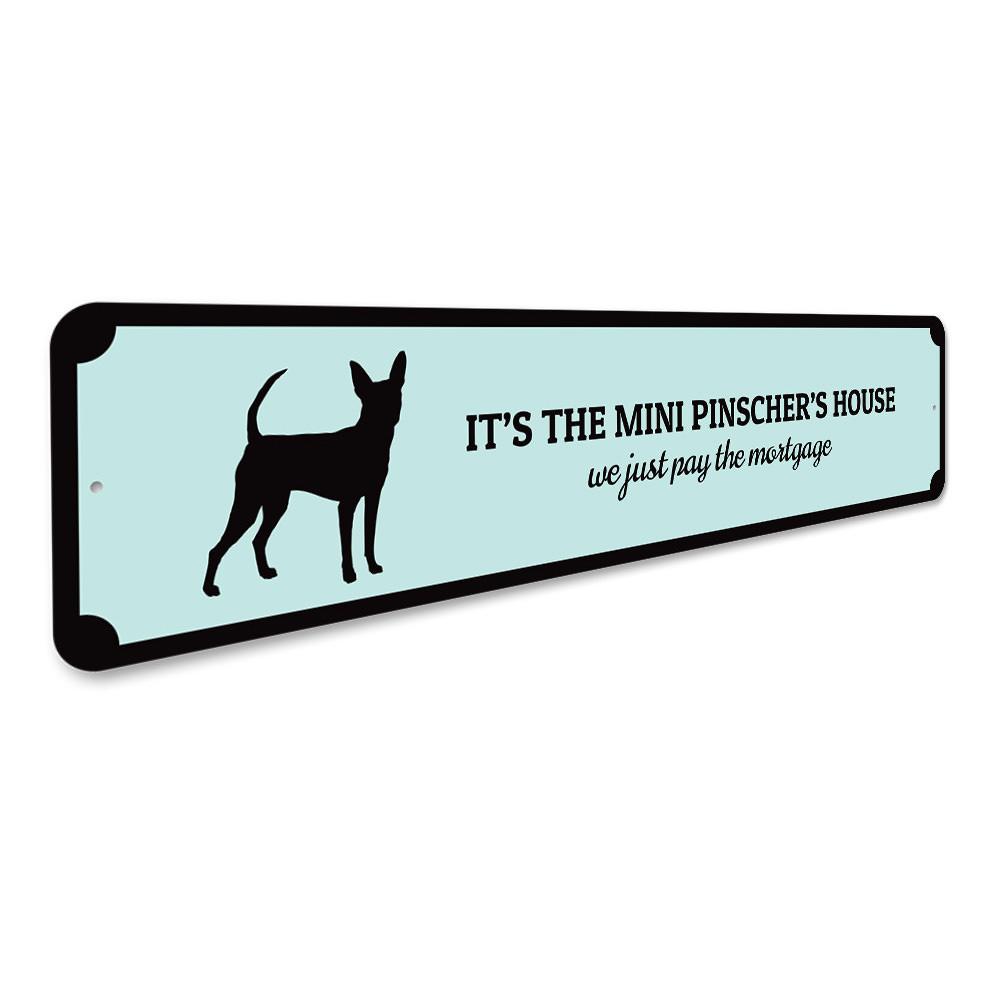 A decorative Mini Pinscher House Sign made of aluminum, featuring a customizable design, perfect for home decor.