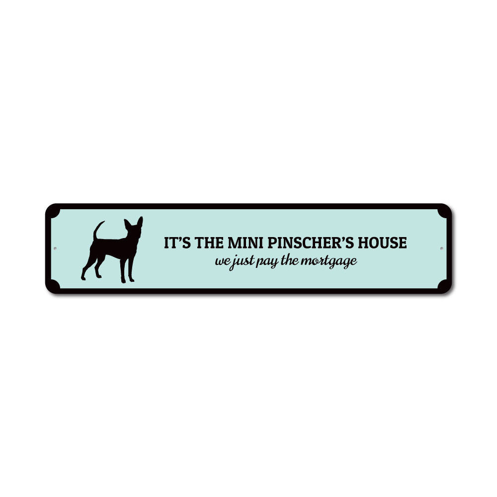A decorative Mini Pinscher House Sign made of aluminum, featuring a customizable design, perfect for home decor.