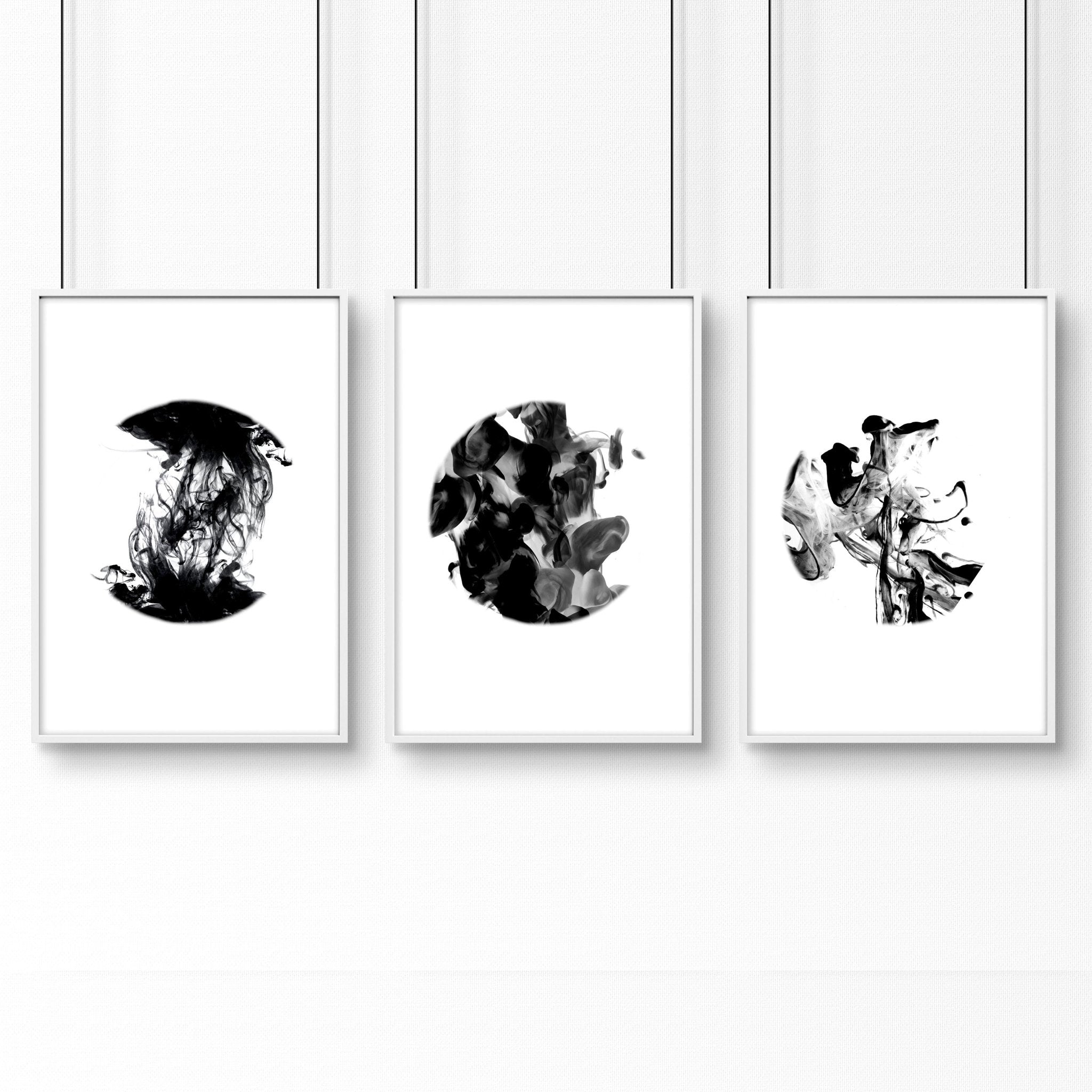 Set of 3 minimalistic wall art prints featuring captivating monochromatic alcohol ink designs, perfect for enhancing living room decor.